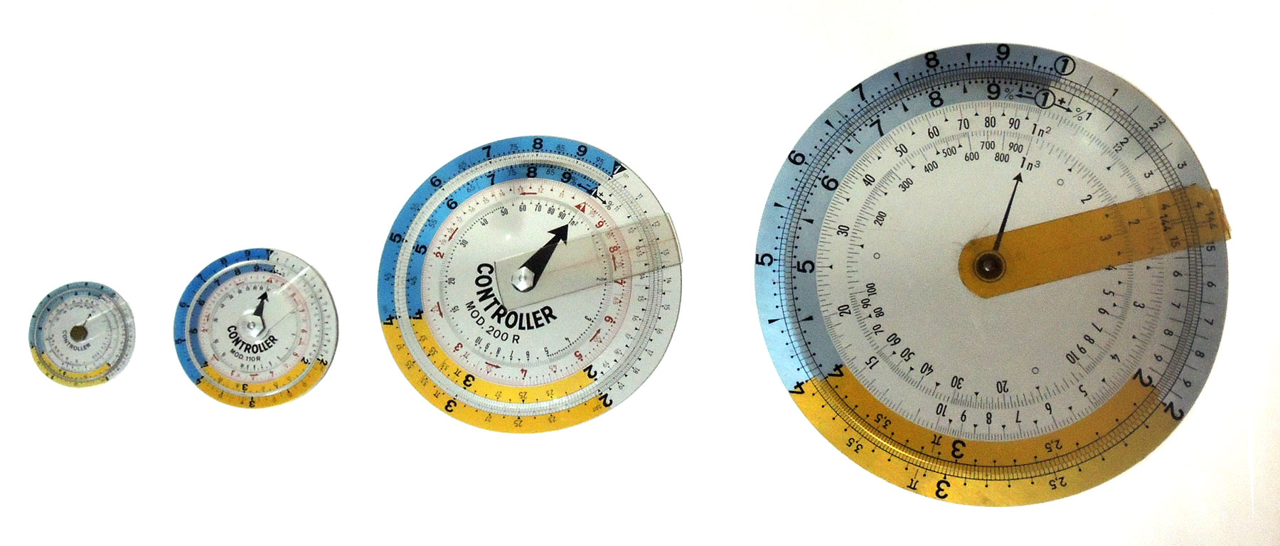 Four Controller circular slide rules