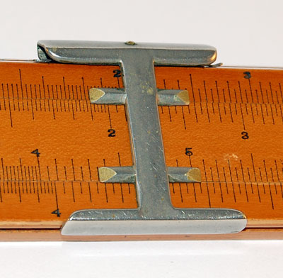 Two-sided chisel cursor on
Jackson brothers Mannheim-type slide rule