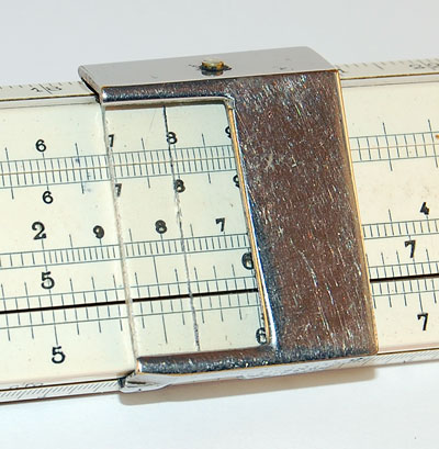 Glass cursor on a Regle Beghin slide rule