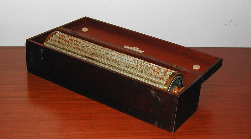 Thacher's cylindrical slide rule in its mahogany box