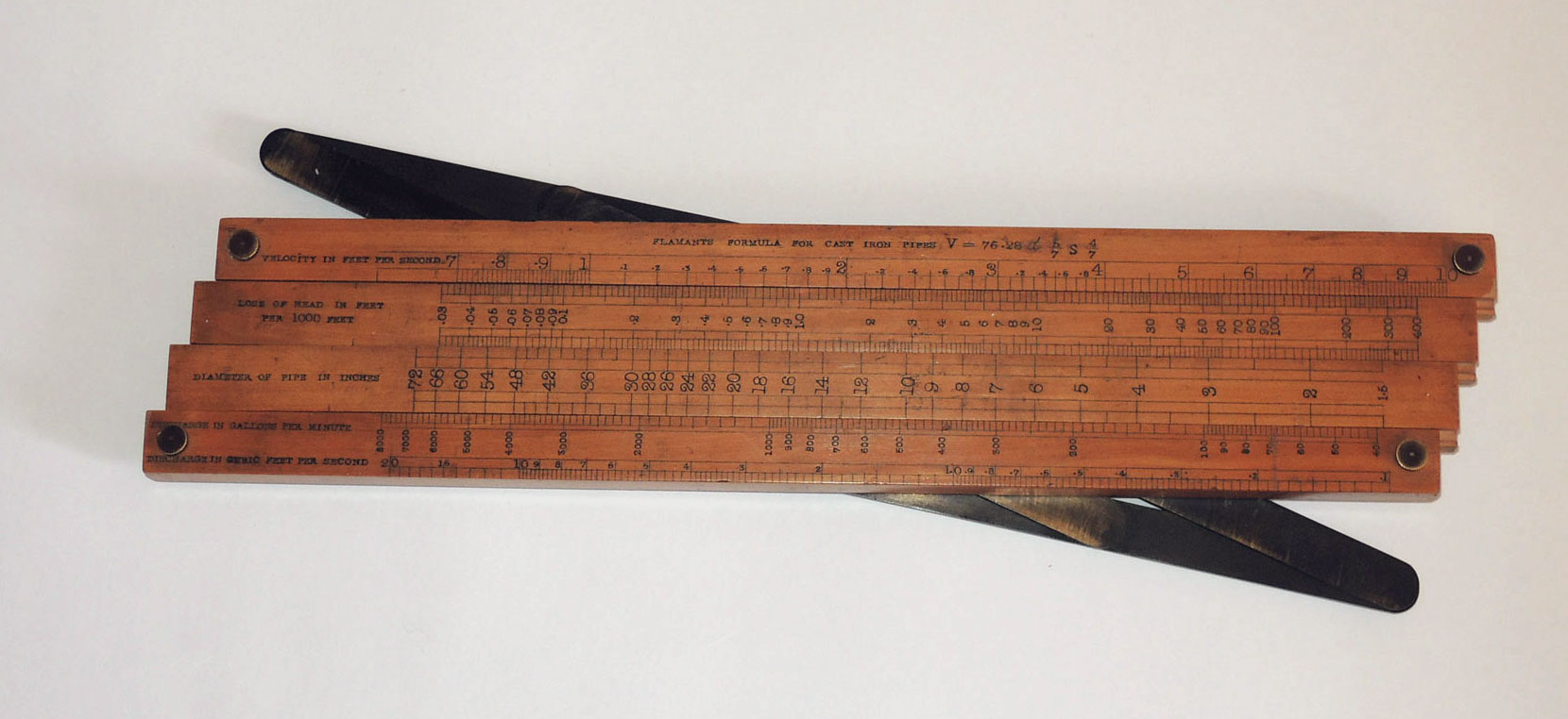 Baines slide rule