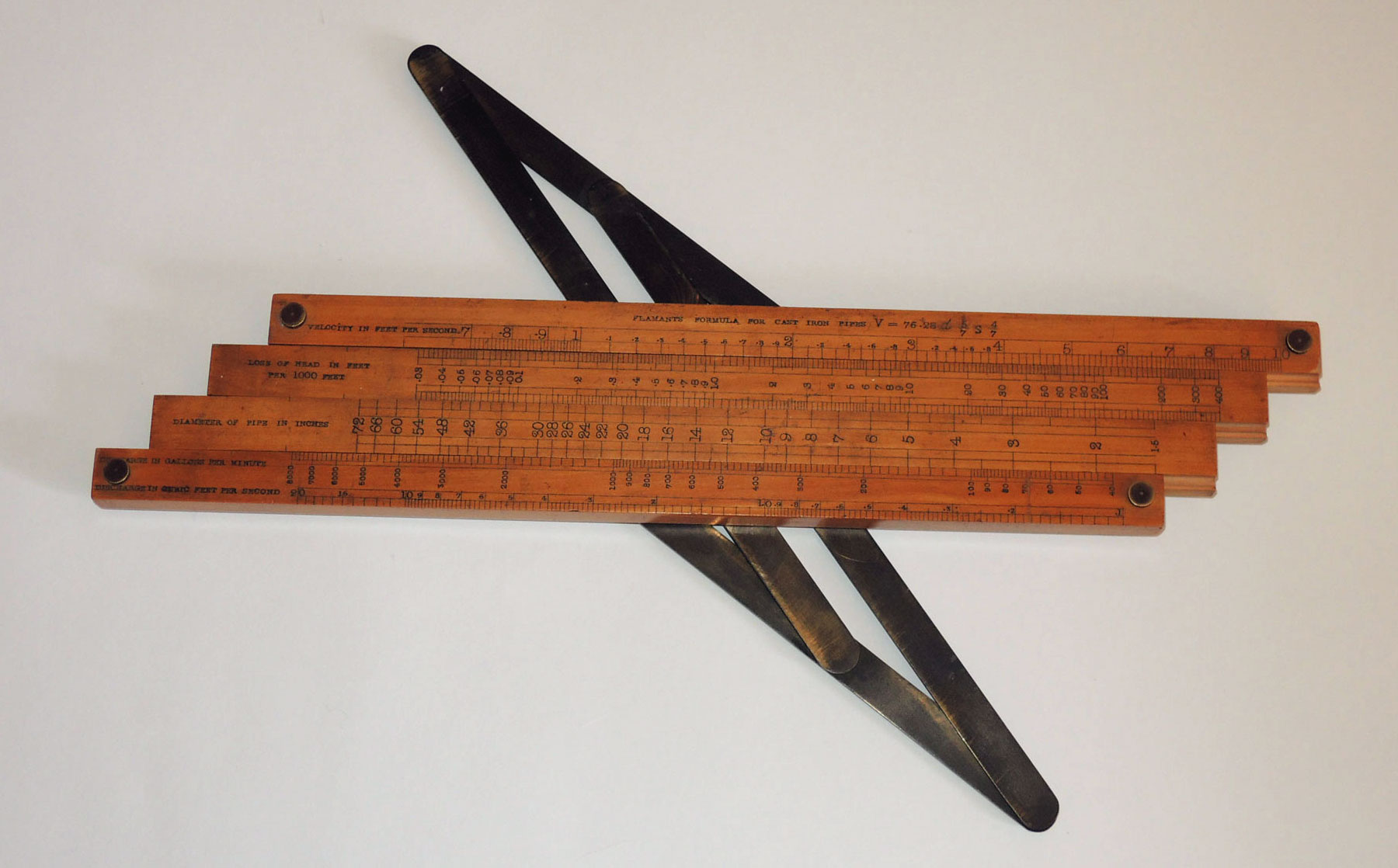 Baines slide rule