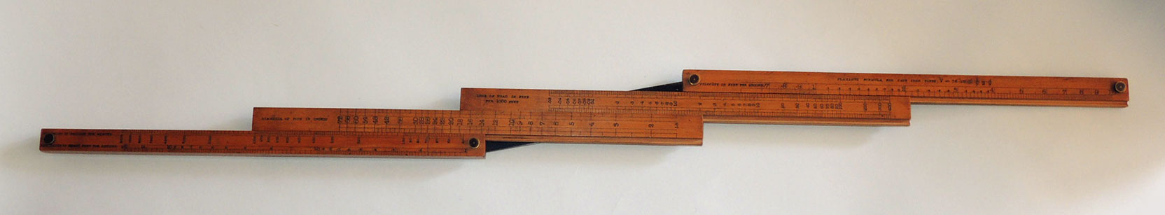 Baines slide rule