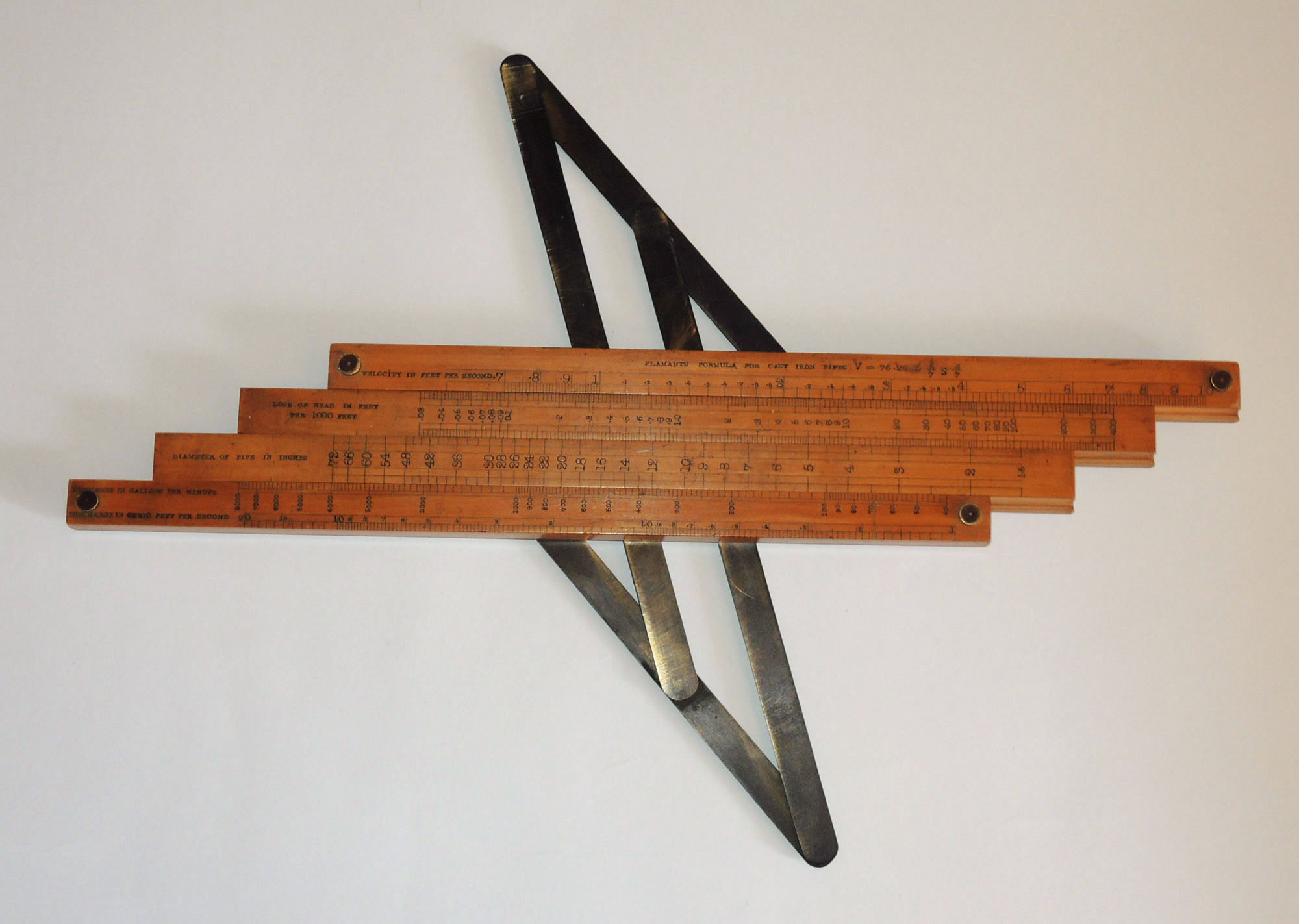 Baines slide rule