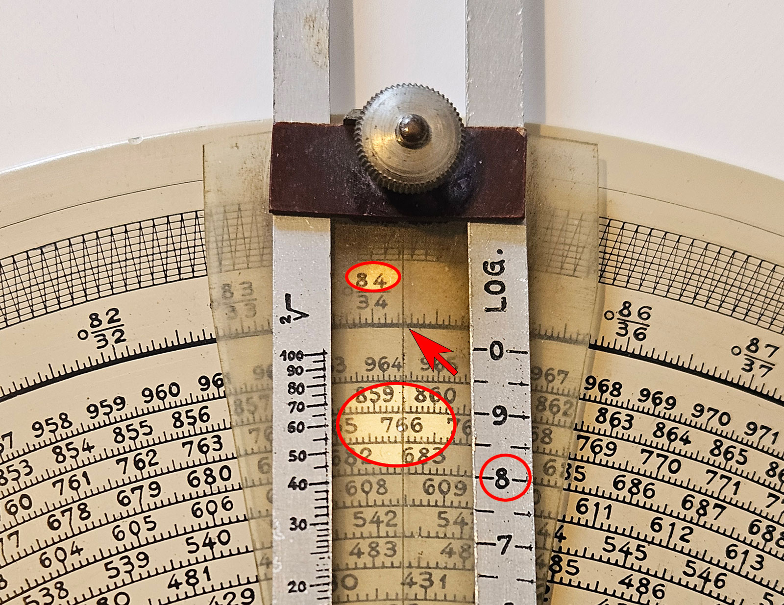 M.E.  Courvoisier spiral slide rule - calculation example