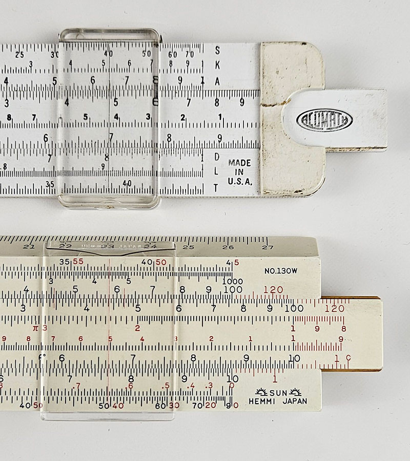 My Acu-Math 400 and Hemmi 130W slide rules
