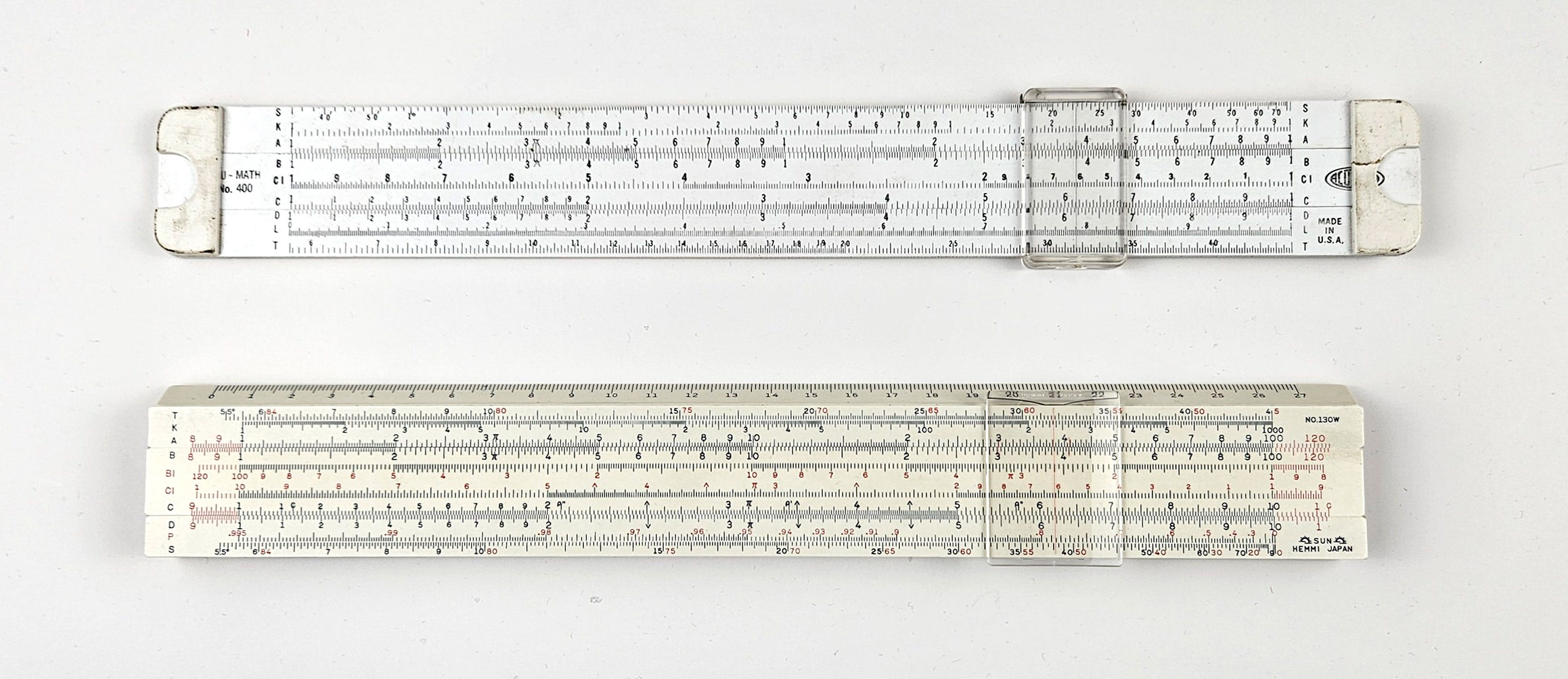 My Acu-Math 400 and Hemmi 130W slide rules
